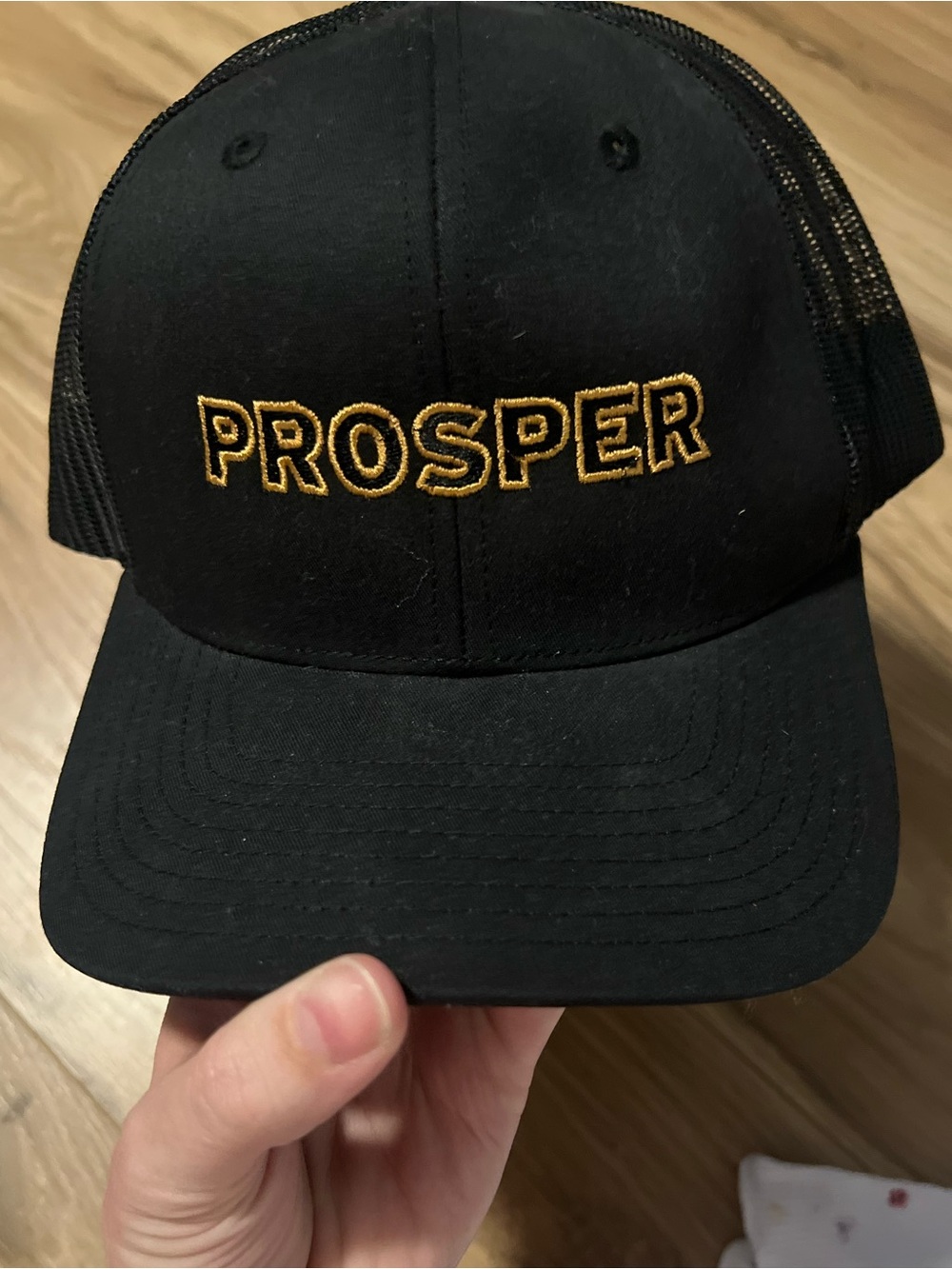 Prosper Embroidered Richardson Black Trucker Cap